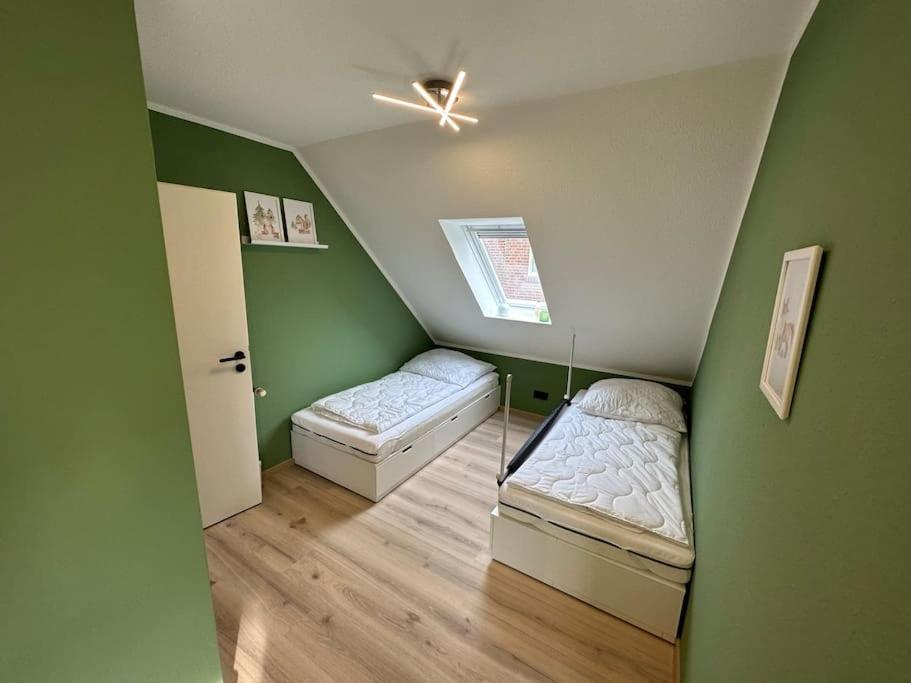 Haus Zuckersnuut Appartement Dornum Buitenkant foto
