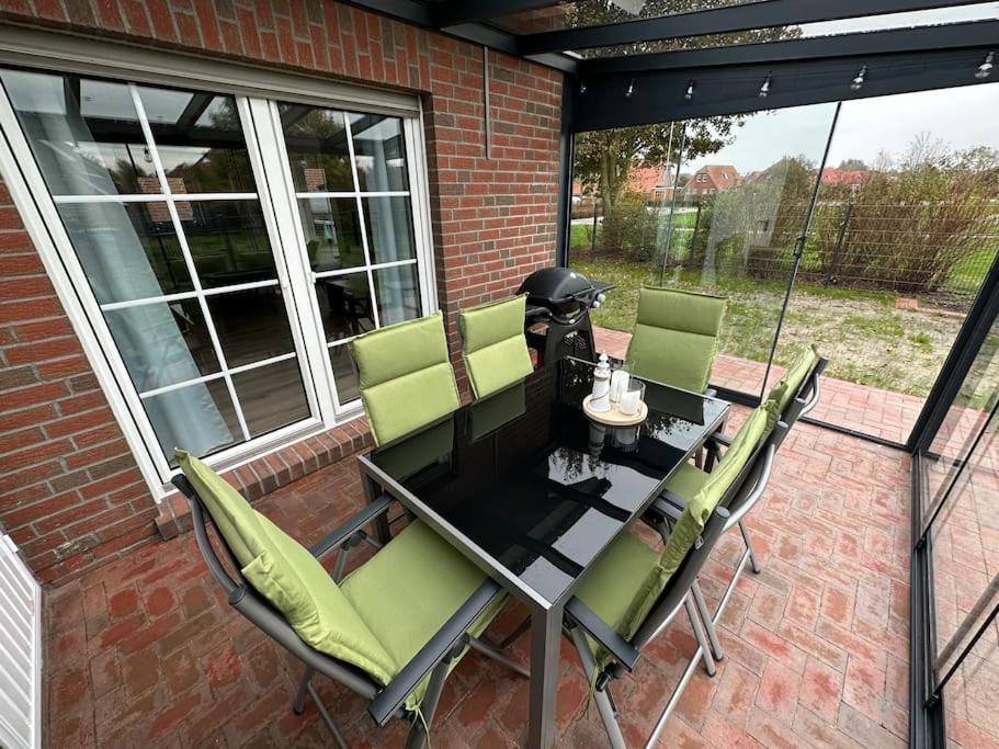 Haus Zuckersnuut Appartement Dornum Buitenkant foto